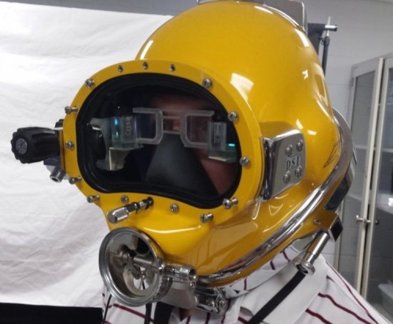 Prototype of DAVD positioned inside a dive helmet, to provide divers with real-time information to complete the mission. (c) Richard Manley/US Navy