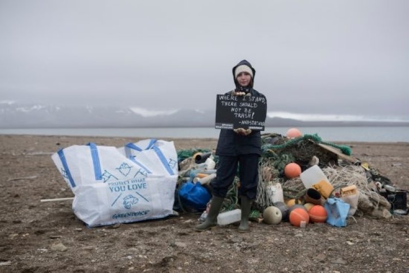 A message to the Norwegian government in front of a pile of garbage collected from a beach at Sarstangen, the west coast of Svalbard. According to the Governor of Svalbard, approximately 80 percent of the trash that ends up on the beaches of Svalbard orig (c) Christian Aslund