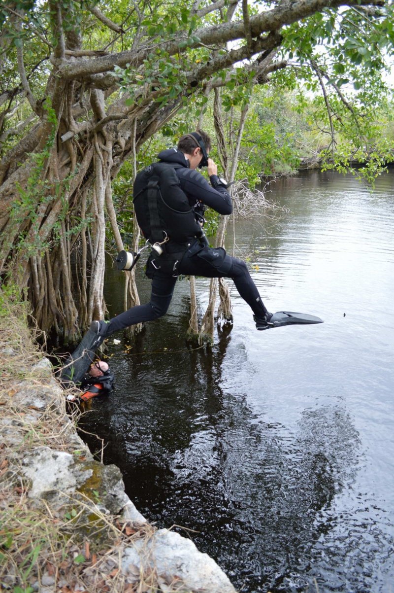 Divers (David Brankovits and Tom Iliffe) entering a cenote in the Yucatan Peninsula
(c) Sergio Benitez