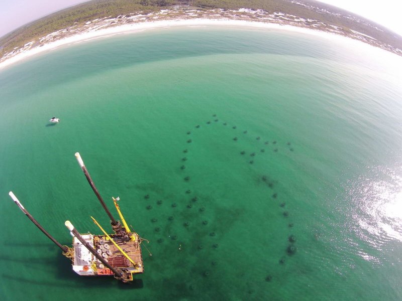SWARA installing the Seahorse-shaped reef off of Topsail Beach in South Walton. (c) Spring Run Media
