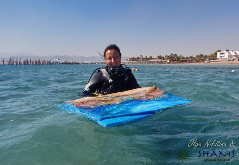 Olga descents with the painting material