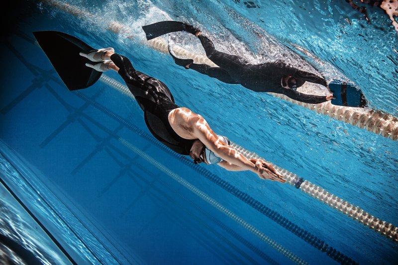 Freedivers during training at a buoy in the ocean